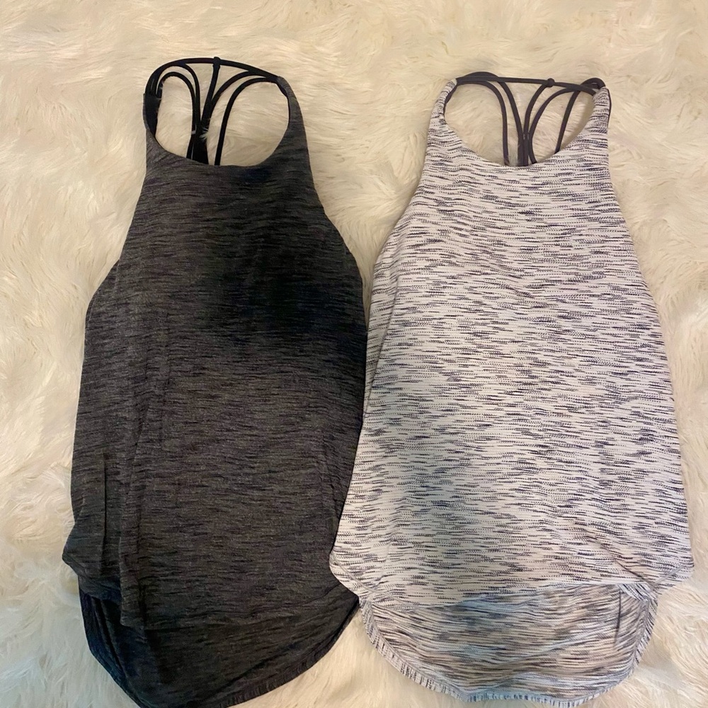 SOLD - Two lululemon Raise the Barre Tanks